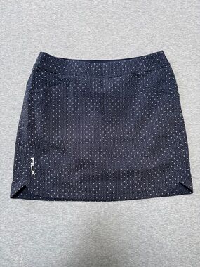 RLX Women's Navy Dot Performance Golf Skort
